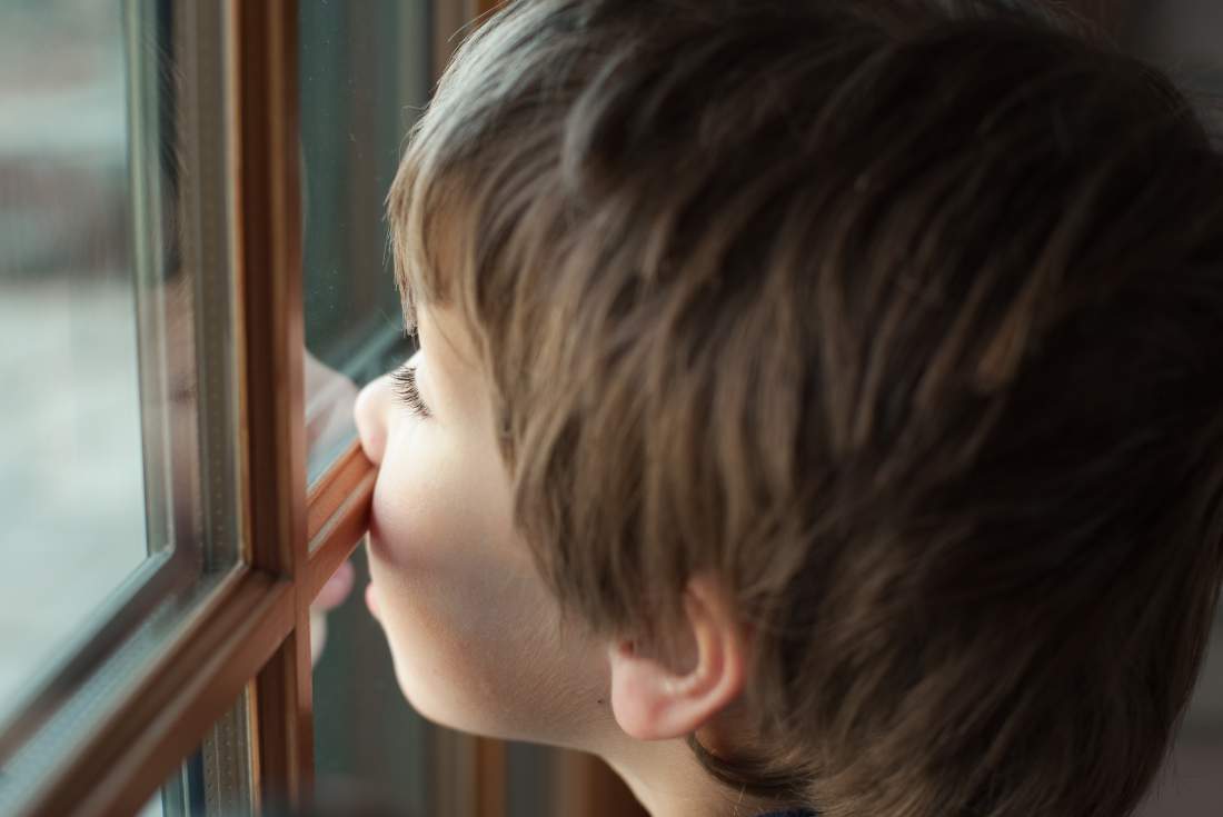 Children with divorced parents spend a lot of time waving from windows. It's sad. Put them first. Always. (Image/Time)