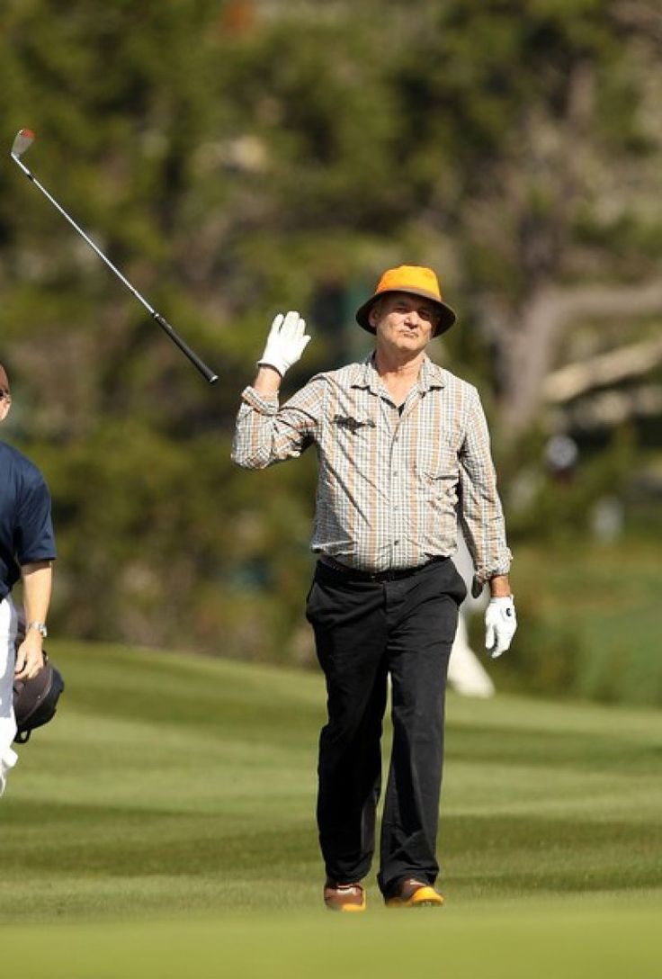 Bill Murray throws golf club