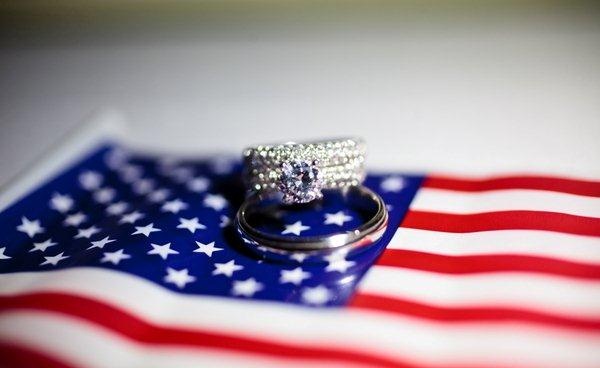 wedding rings on american flag