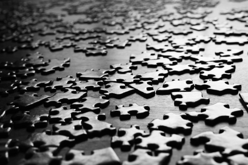 black and white puzzle pieces